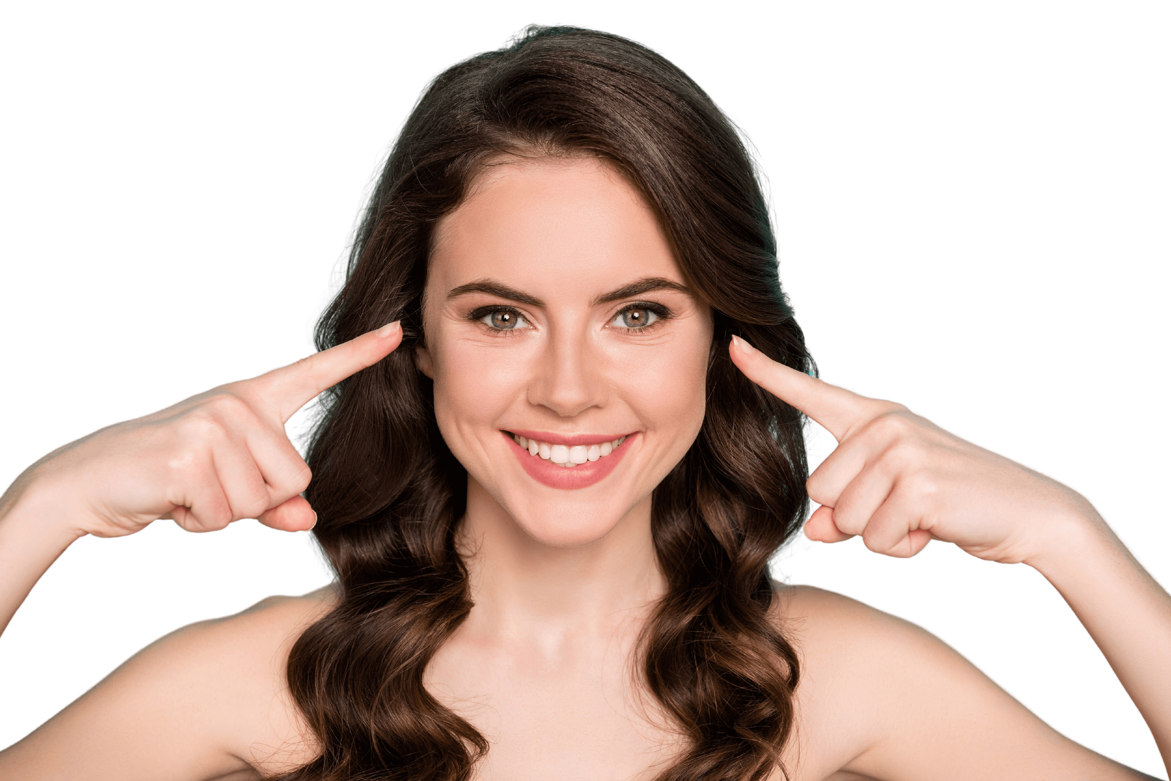 Smiling woman pointing to her cheeks and temples, highlighting natural facial volume and youthful contours after fat transfer treatment